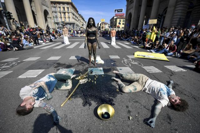 Activists stage global climate protest, slam Ukraine war..... Activists stage global climate protest, slam Ukraine war