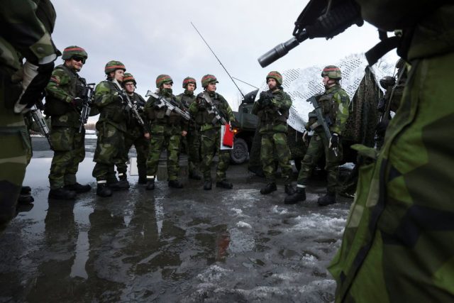 NATO, in Arctic training drills, faces up to Putin's 'unpredictable' Russia.. NATO, in Arctic training drills, faces up to Putin's 'unpredictable' Russia.