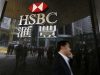 HSBC Faces $600M Penalties for Forex Manipulation Traders working on the floor of a busy foreign exchange market