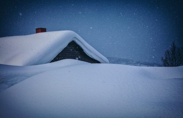 Heavy Snowfall Highlights Infrastructure Weakness in Afghanistan and Pakistan Snow-covered rooftops in a rural Afghan village after a heavy snowstorm caused structural damage and highway closures.