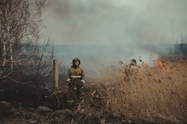 Propane Blast Levels Pennsylvania Home, Killing Six Children and One Adult Firefighters inspect a leveled home site after a propane blast in rural Pennsylvania, with debris scattered across the property.