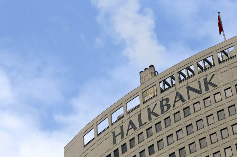 Exterior view of Halkbank headquarters in Ankara with Turkish flags flying above the entrance